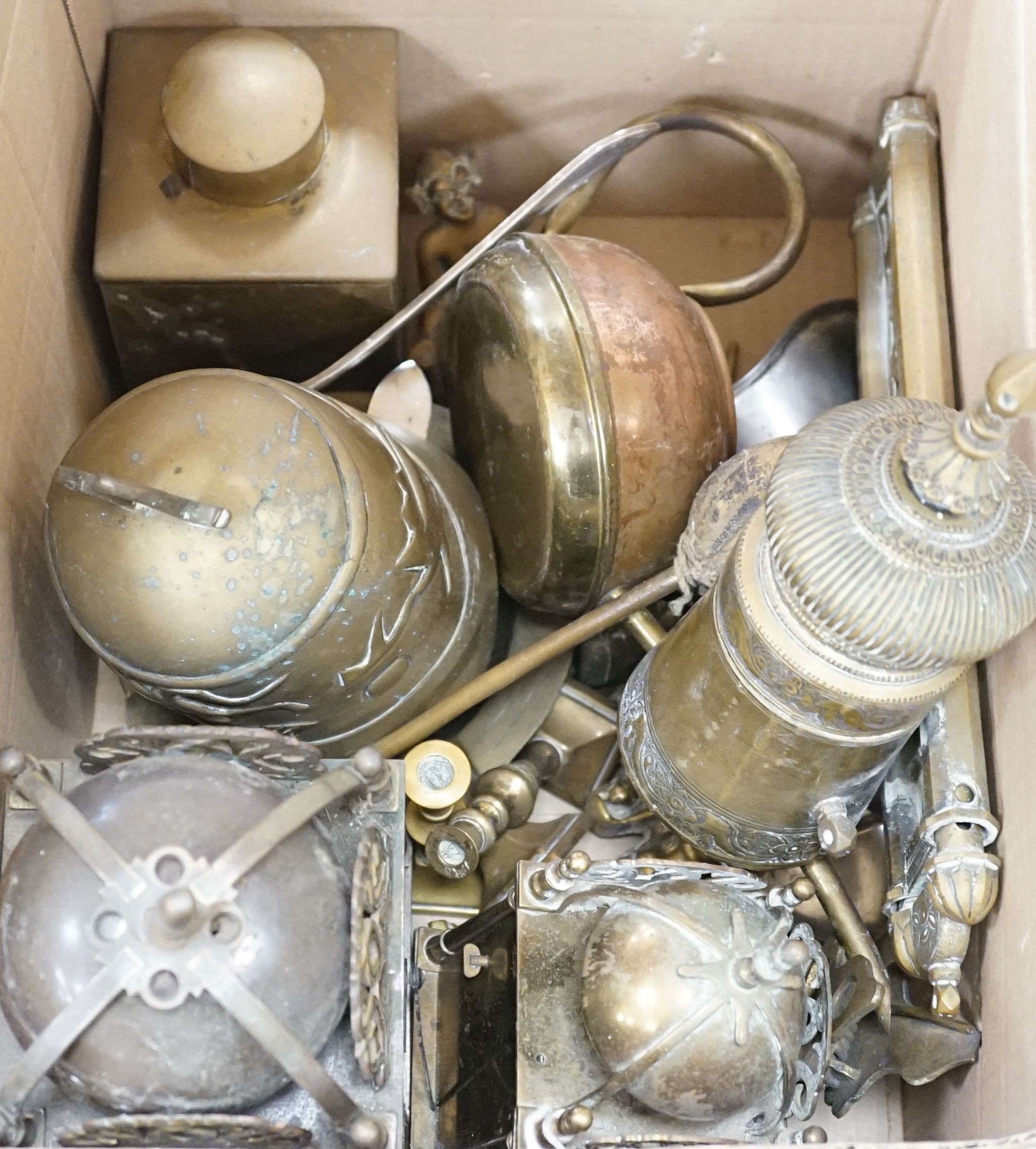 Two brass lantern timepieces, an Islamic brass scribe’s case and other brass ware, lantern clock 27 cms high.